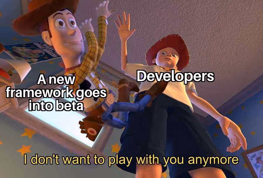 Anthony Adams rubbing hands together behind a tree